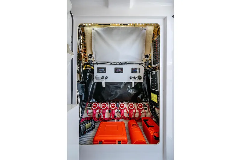 Slide: The Image of Electrical panel and equipment inside a 2017 Bahama 41 boat. - 50