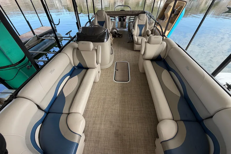 Slide: The Image of Interior of a 2018 JC 25 Neptoon TT Sport pontoon boat with plush seating. - 10