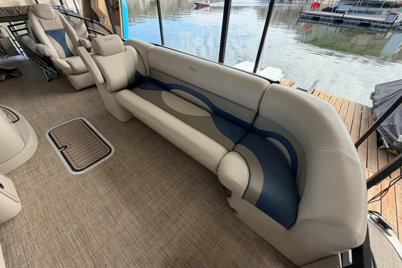 Slide: The Image of Interior of 2018 JC 25 Neptoon TT Sport pontoon boat with plush seating. - 12