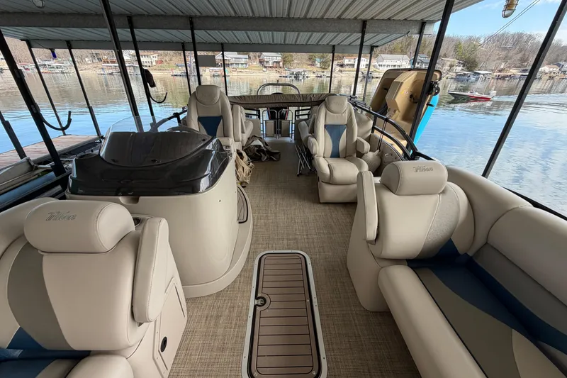 Slide: The Image of Interior of a 2018 JC 25 Neptoon TT Sport pontoon boat with plush seating. - 15