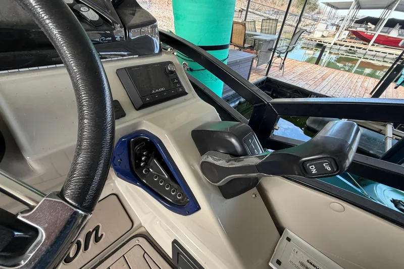 Slide: The Image of Control panel of a 2018 JC 25 Neptoon TT Sport boat at a dock. - 21