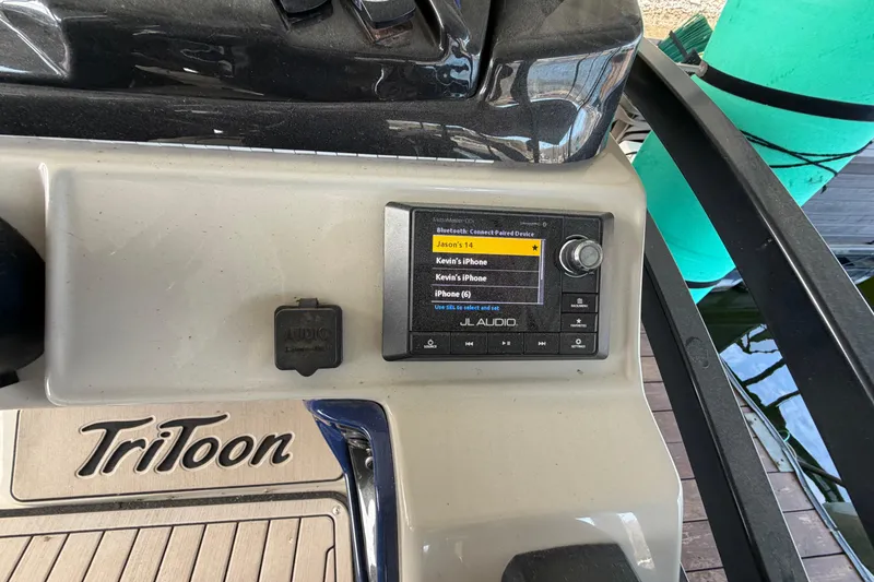 Slide: The Image of Control panel of a 2018 JC 25 Neptoon TT Sport boat with JL Audio system. - 24