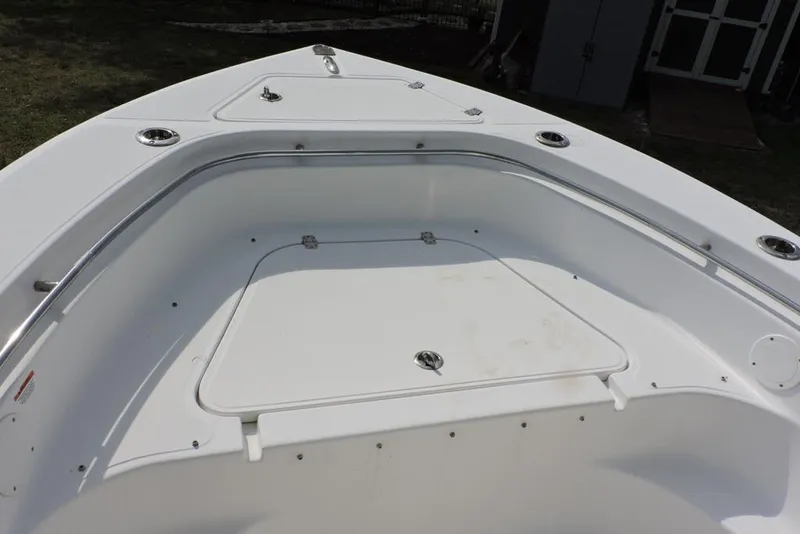 Slide: The Image of 2007 Sea Fox 216 Center Console boat's bow area with storage compartment. - 14