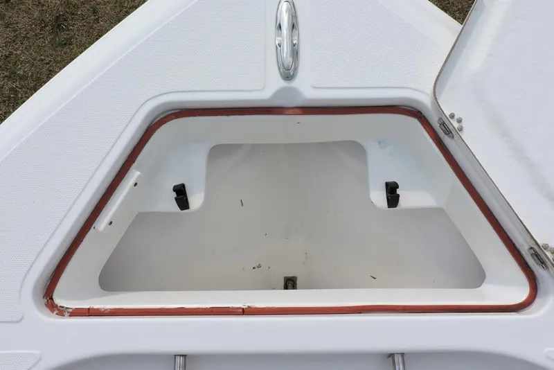 Slide: The Image of Open storage compartment on a 2007 Sea Fox 216 Center Console boat. - 15