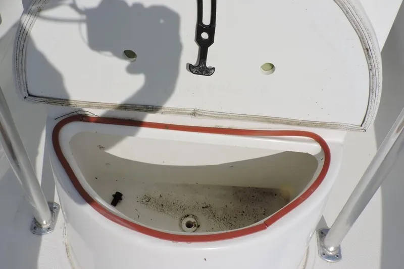 Slide: The Image of Open storage compartment on 2007 Sea Fox 216 Center Console boat. - 17