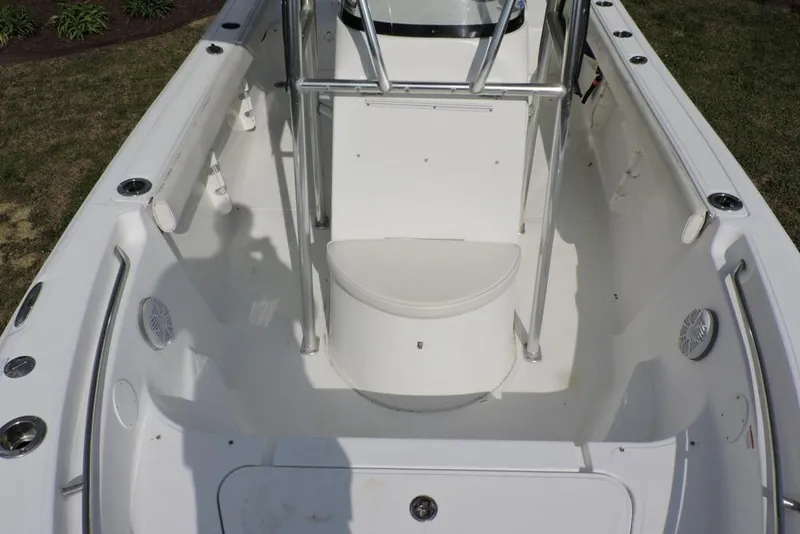 Slide: The Image of 2007 Sea Fox 216 Center Console boat interior with seating and stainless steel railings. - 20