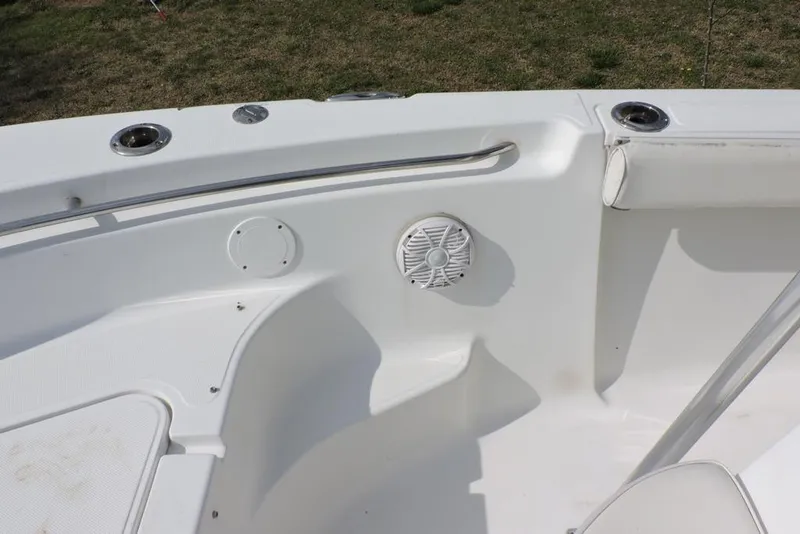 Slide: The Image of 2007 Sea Fox 216 Center Console boat interior with speaker and rod holders. - 24