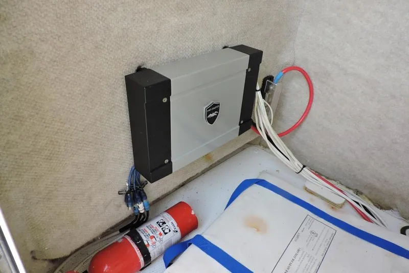 Slide: The Image of 2007 Sea Fox 216 Center Console interior with wiring and fire extinguisher. - 25