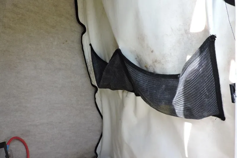 Slide: The Image of Interior storage netting on a 2007 Sea Fox 216 Center Console boat. - 26