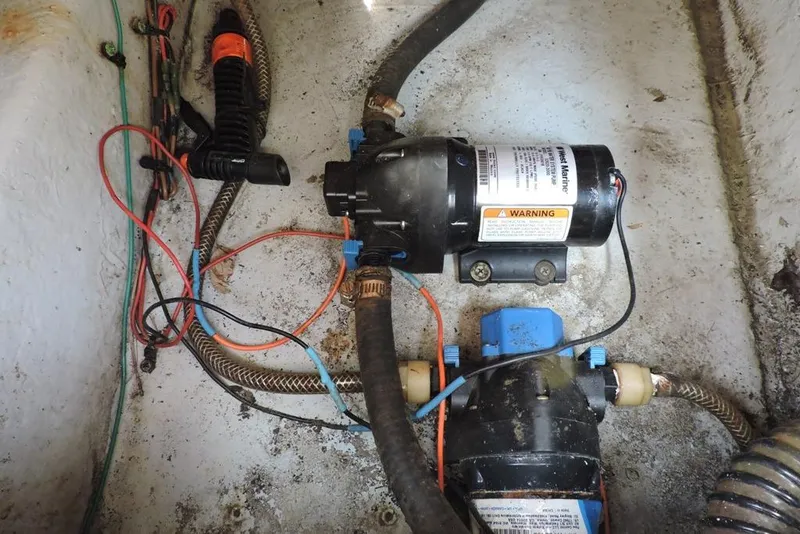 Slide: The Image of Electrical wiring and pump system inside a 2007 Sea Fox 216 Center Console boat. - 27
