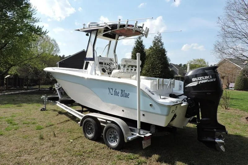 Slide: The Image of 2007 Sea Fox 216 Center Console boat on trailer with Suzuki outboard motor. - 4