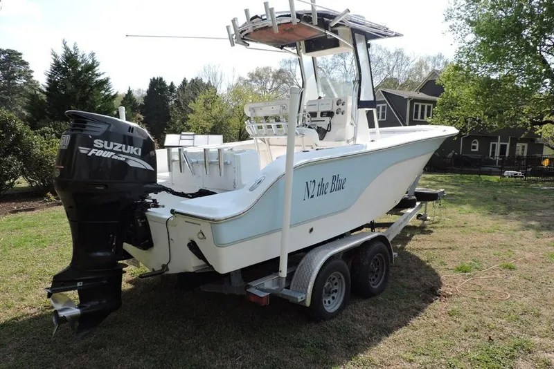 Slide: The Image of 2007 Sea Fox 216 Center Console boat on trailer with Suzuki outboard motor. - 6