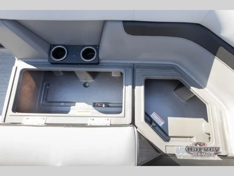 Slide: The Image of Interior of 2026 Vectra Classic 19 L with storage and cup holders. - 11