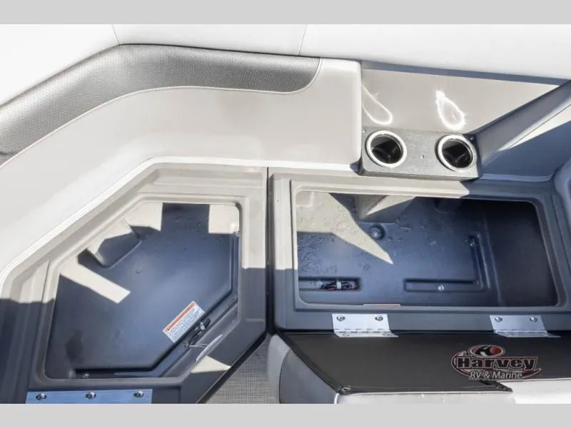 Slide: The Image of Interior of 2026 Vectra Classic 19 L with storage and cup holders. - 9