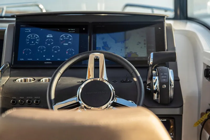 Slide: The Image of Manufacturer Provided Image: Control console of Nimbus Commuter 9, year 2026. - 5