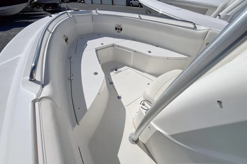 Slide: The Image of 2008 Robalo R260 Center Console boat interior with seating and storage compartments. - 7