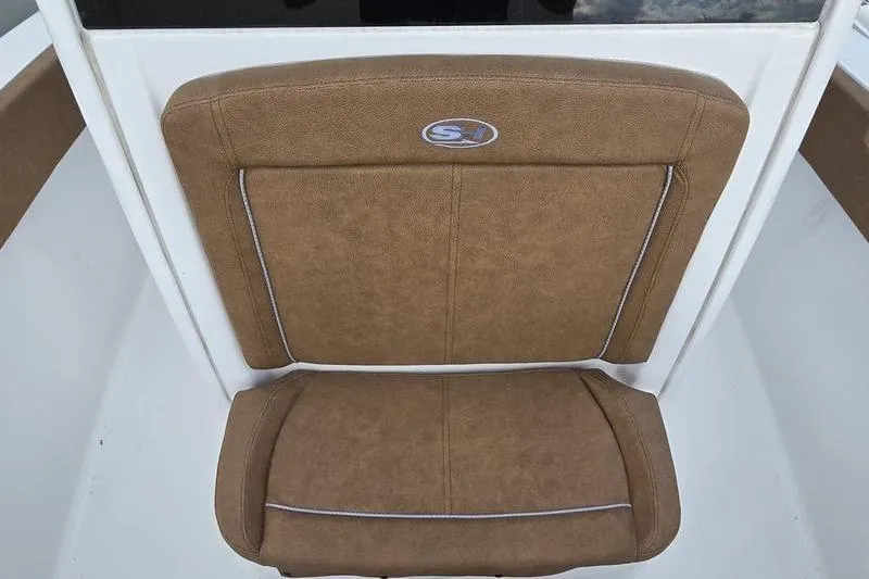 Slide: The Image of Brown cushioned seat on 2026 Sea Hunt Ultra 265 SE boat. - 15