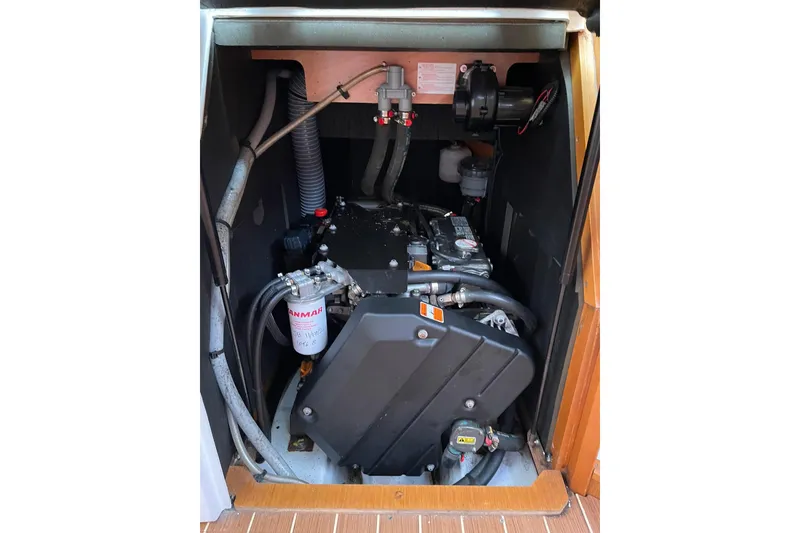 Slide: The Image of Engine compartment of 2016 Jeanneau Sun Odyssey 44 DS sailboat, featuring Yanmar components. - 16