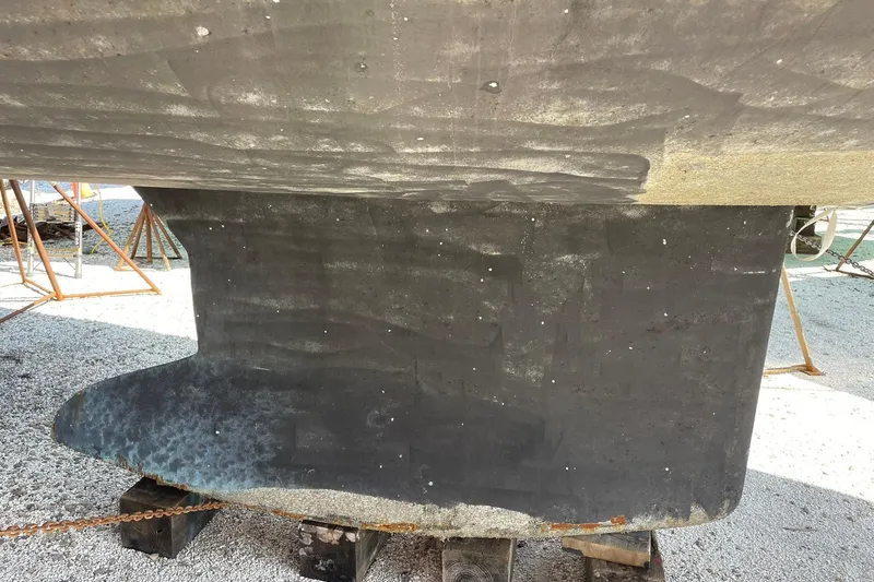 Slide: The Image of Keel of 2016 Jeanneau Sun Odyssey 44 DS sailboat on dry dock. - 20