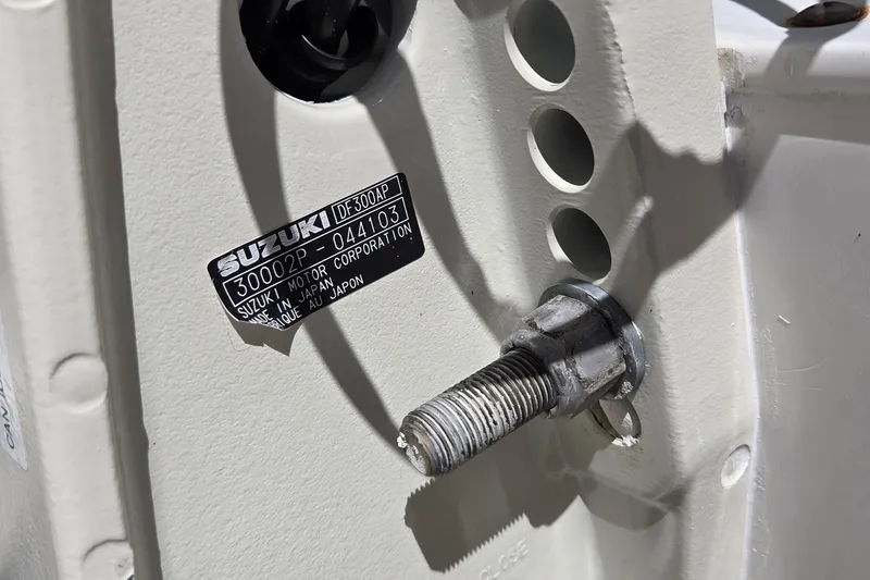 Slide: The Image of Close-up of Suzuki DF300AP motor label on 2005 Everglades 223 Center Console boat. - 22