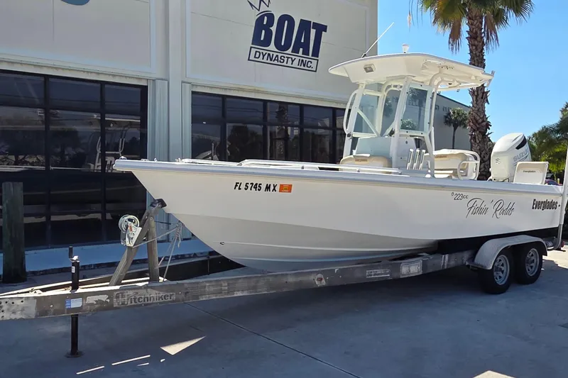 Slide: The Image of 2005 Everglades 223 Center Console boat on trailer outside dealership. - 5