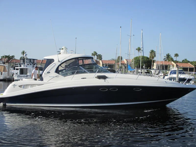 Slide: The Image of 2005 Sea Ray 390 Sundancer yacht in harbor. - 2