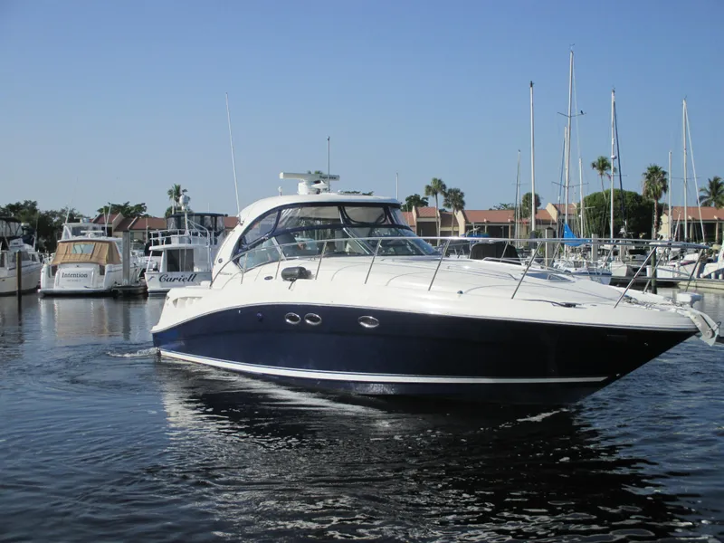 Slide: The Image of 2005 Sea Ray 390 Sundancer yacht in harbor. - 3