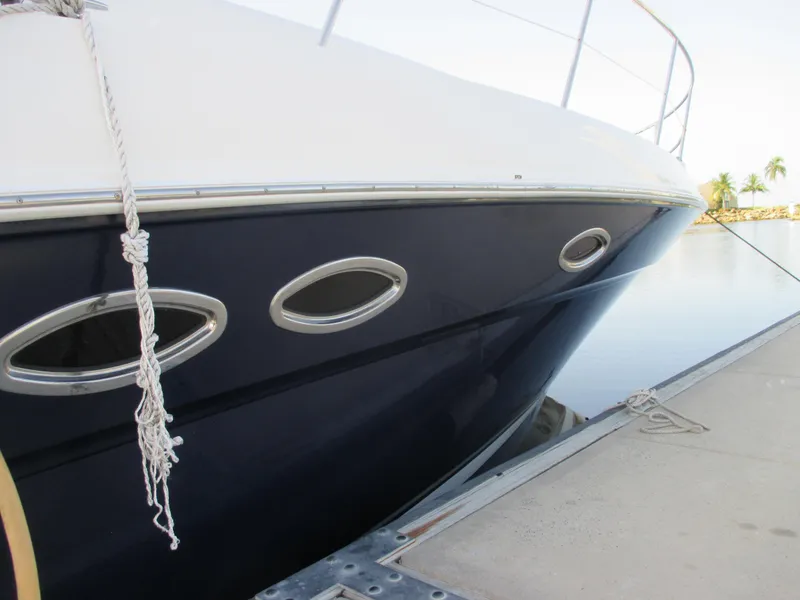 Slide: The Image of 2005 Sea Ray 390 Sundancer at dock, side view. - 5