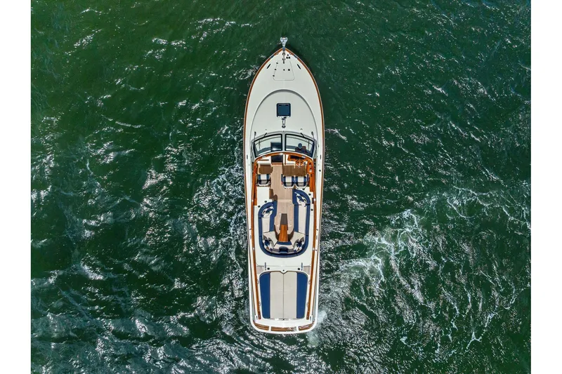 Slide: The Image of Aerial view of 2008 Hinckley Talaria 38R yacht cruising on open water. - 4