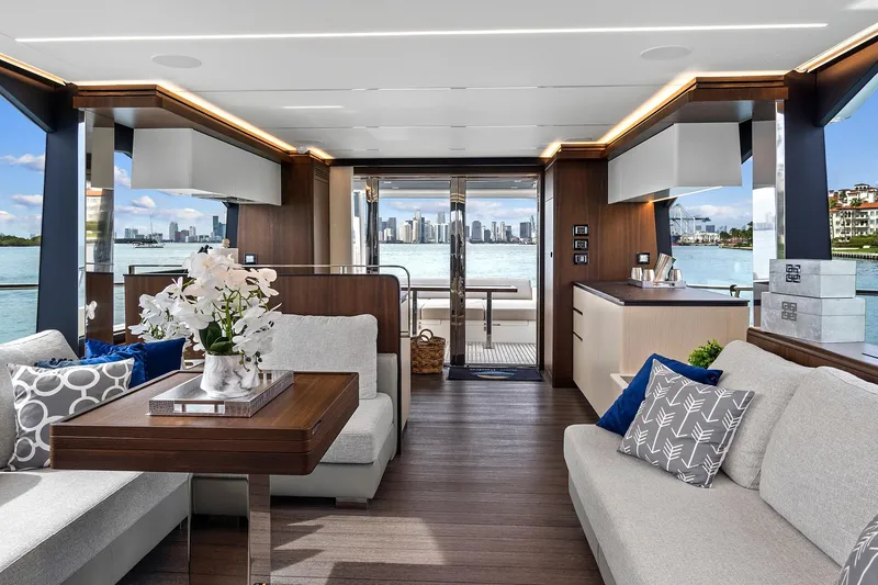 Slide: The Image of Luxurious interior of 2022 Astondoa 66 Flybridge yacht with elegant seating and scenic view. - 24