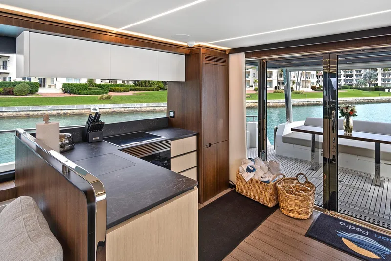 Slide: The Image of Luxurious interior of 2022 Astondoa 66 Flybridge yacht with modern design and waterfront views. - 31