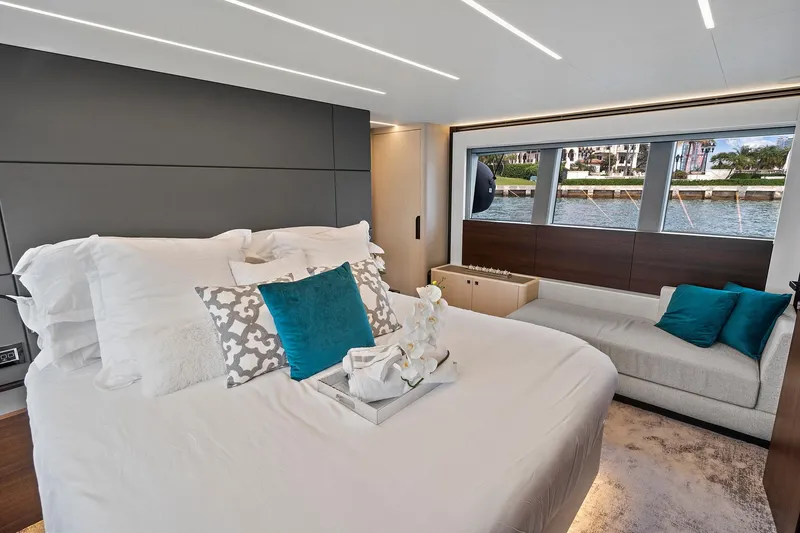Slide: The Image of Luxurious bedroom interior of 2022 Astondoa 66 Flybridge yacht with waterfront view. - 41