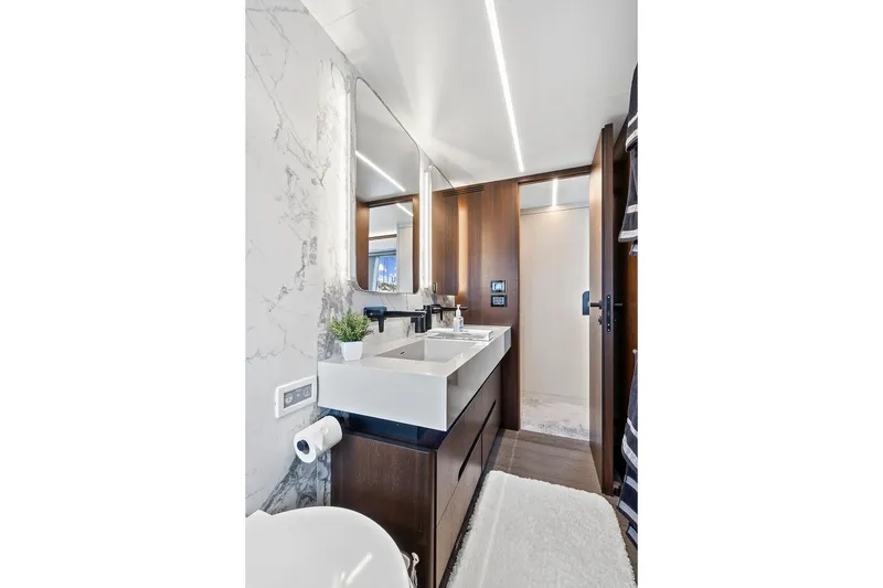 Slide: The Image of Luxurious bathroom in 2022 Astondoa 66 Flybridge yacht with modern fixtures and elegant design. - 44