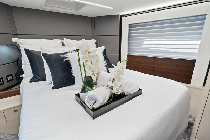 Slide: The Image of Luxurious bedroom interior of 2022 Astondoa 66 Flybridge yacht with elegant decor. - 47