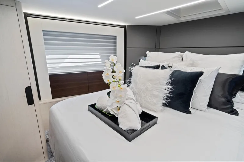 Slide: The Image of Luxurious bedroom interior of 2022 Astondoa 66 Flybridge yacht with elegant decor. - 48