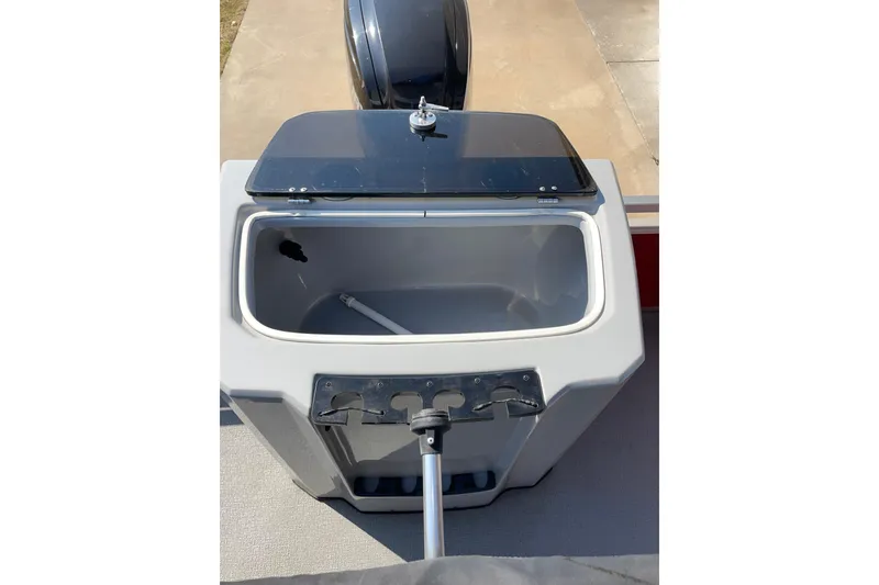 Slide: The Image of Open storage compartment on 2016 Silver Wave 230 Island CC boat. - 11