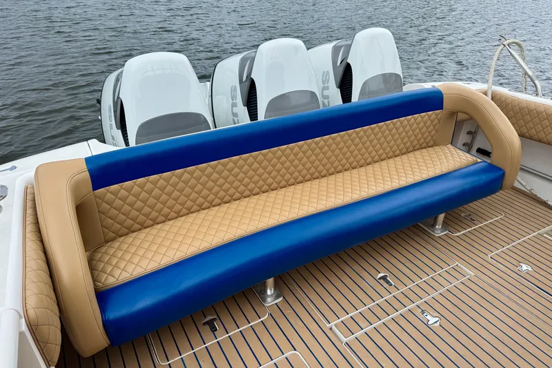 Slide: The Image of Luxurious seating on 2012 Intrepid 390 Sport Yacht with triple outboard engines. - 19