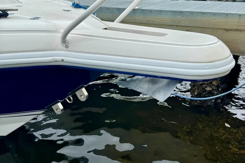 Slide: The Image of 2012 Intrepid 390 Sport Yacht stern view at dockside. - 24