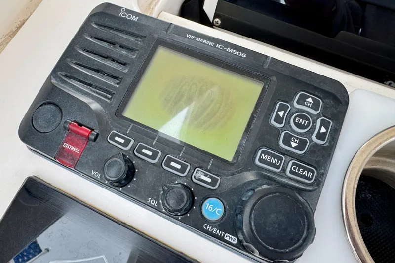 Slide: The Image of ICOM VHF marine radio on 2012 Intrepid 390 Sport Yacht dashboard. - 28