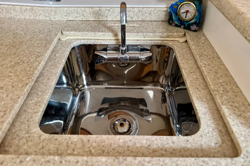 Slide: The Image of Stainless steel sink with faucet in 2012 Intrepid 390 Sport Yacht kitchen. - 40