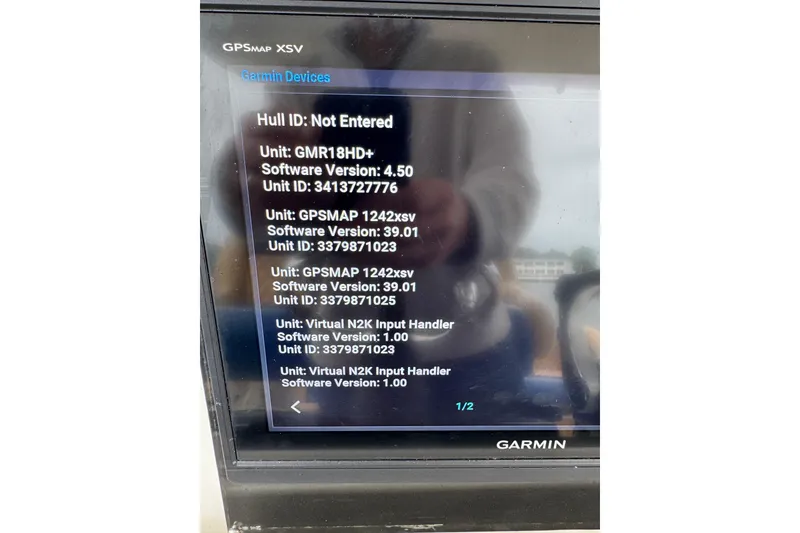 Slide: The Image of Garmin GPSMAP XSV display on 2012 Intrepid 390 Sport Yacht showing software versions. - 51