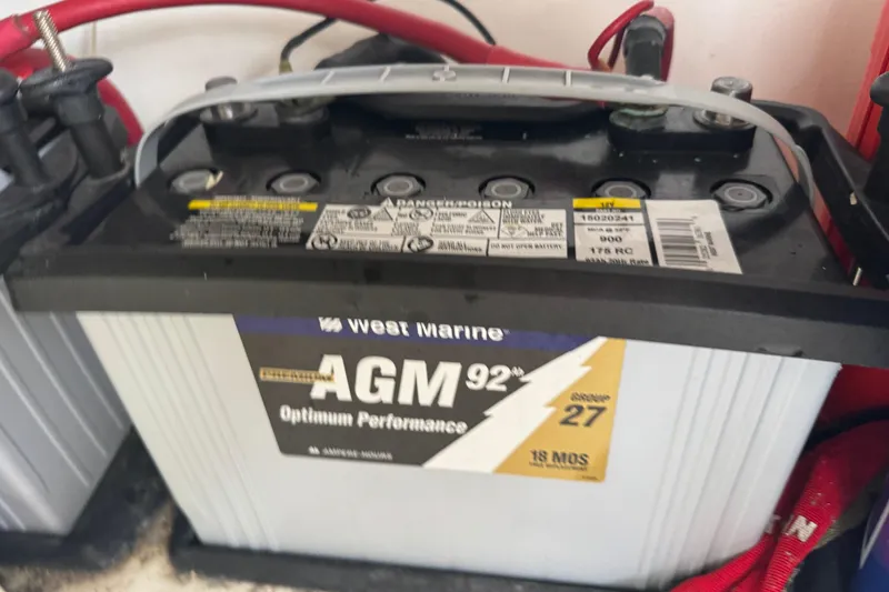 Slide: The Image of West Marine AGM battery in a 2012 Intrepid 390 Sport Yacht. - 54