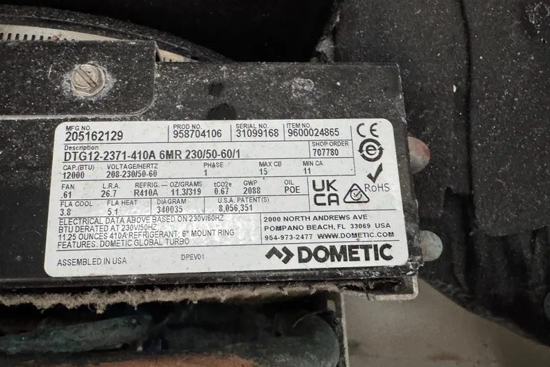 Slide: The Image of Label on Dometic air conditioning unit for 2012 Intrepid 390 Sport Yacht. - 58