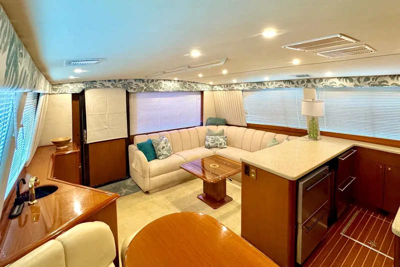 Slide: The Image of Luxurious interior of 1998 Ocean Yachts 48 Super Sport with elegant seating and modern amenities. - 14