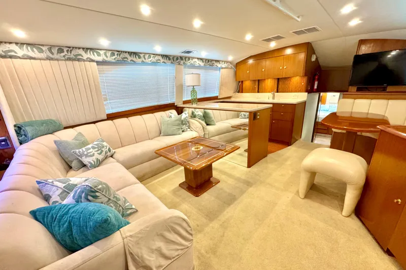Slide: The Image of Luxurious interior of a 1998 Ocean Yachts 48 Super Sport with plush seating and elegant decor. - 5