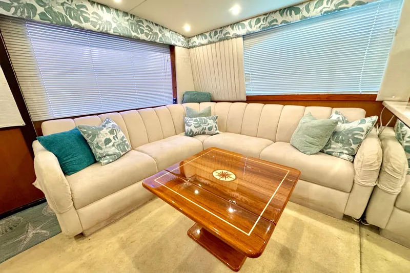 Slide: The Image of Luxurious interior of 1998 Ocean Yachts 48 Super Sport with plush seating and elegant decor. - 6
