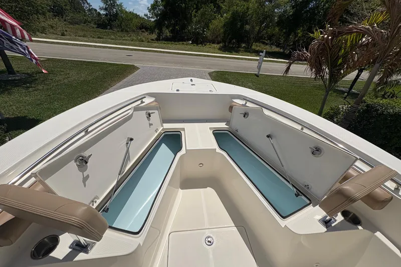 Slide: The Image of 2022 Sea Born LX22 Center Console interior wiring compartment. - 24