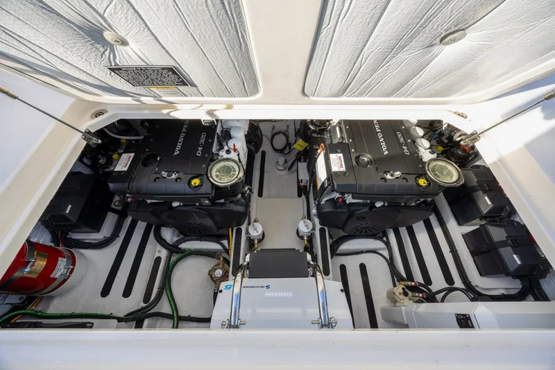 Slide: The Image of Engine compartment of 2027 Sabre 38 Salon Express with dual Volvo Penta engines. - 11