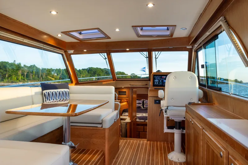 Slide: The Image of Luxurious interior of 2027 Sabre 38 Salon Express yacht with elegant wood finishes. - 4