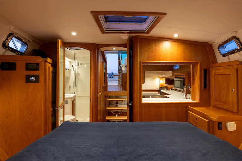 Slide: The Image of Luxurious interior of 2027 Sabre 38 Salon Express yacht with wood finish and modern amenities. - 6